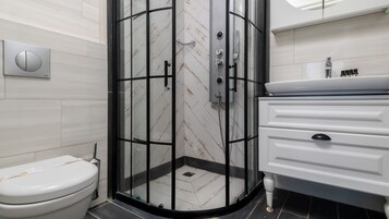 Standard Double Room | Bathroom | Shower, hair dryer, slippers, towels