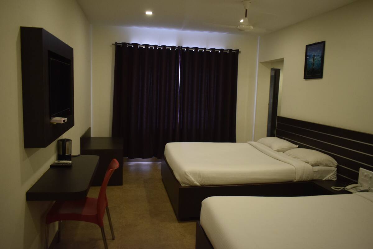 Family Room | Desk, bed sheets
