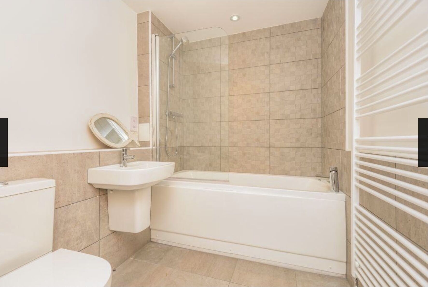 Combined shower/bathtub, hair dryer, towels, soap