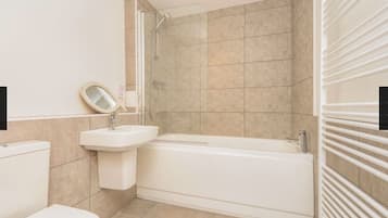 Combined shower/bathtub, hair dryer, towels, soap