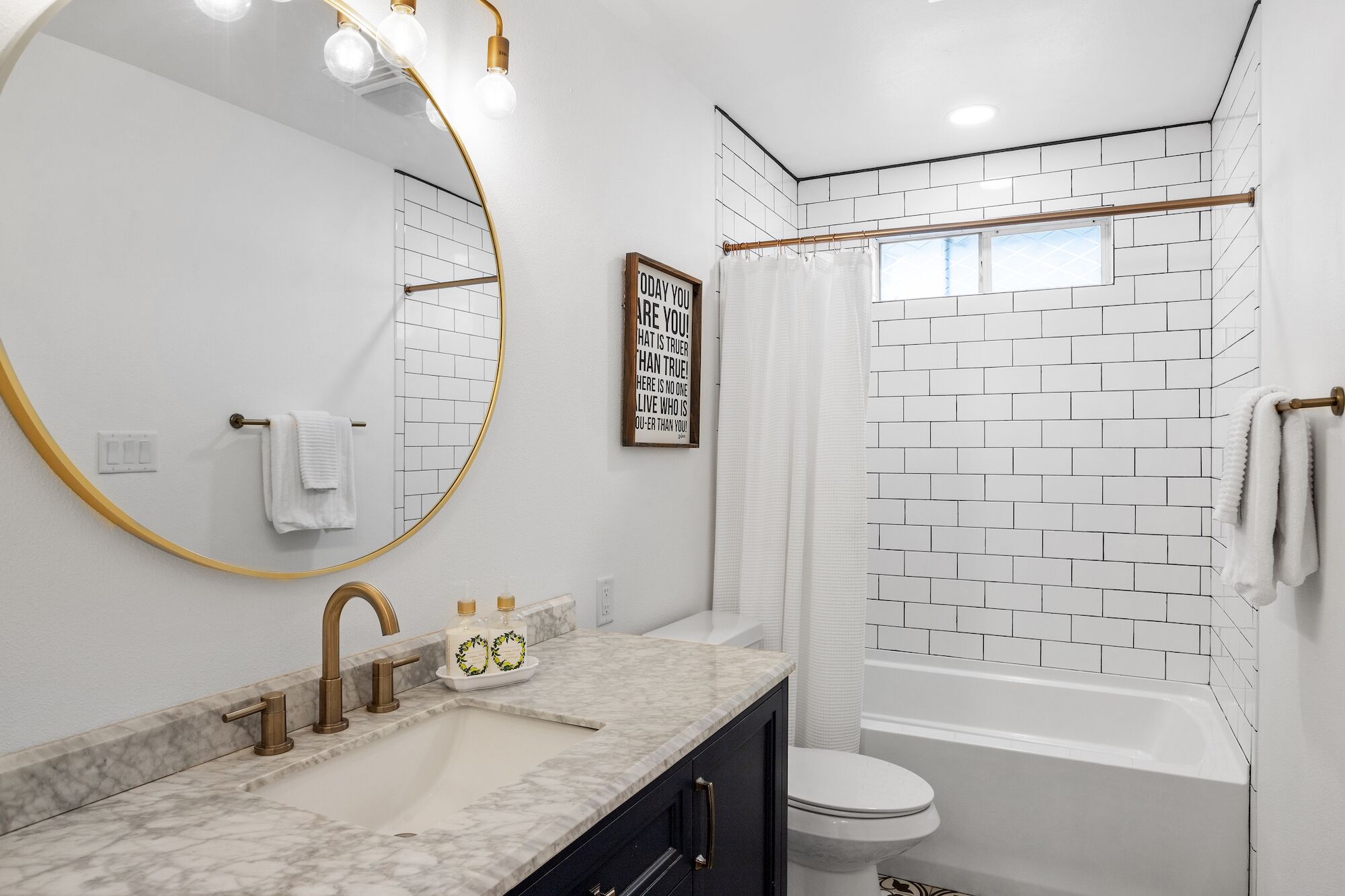Combined shower/tub, hair dryer, towels, soap