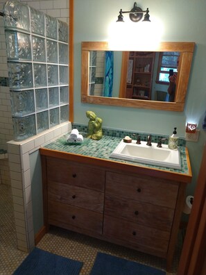 Shower, eco-friendly toiletries, hair dryer, towels