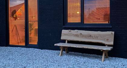 Luxury vacation home including boat and heated veranda in Stavoren