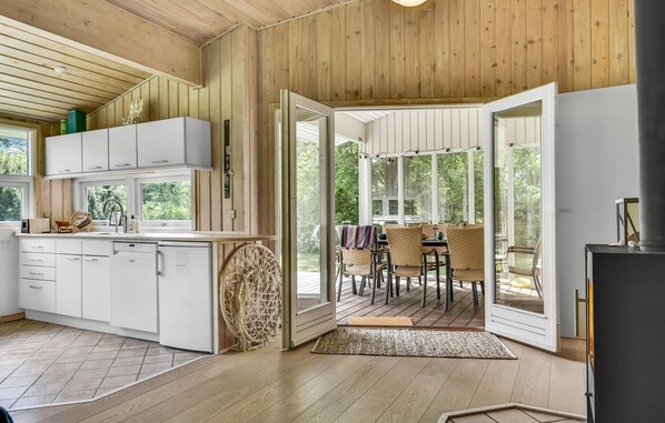 Fridge, stovetop, dishwasher, coffee/tea maker