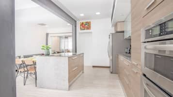 Fridge, oven, coffee/tea maker, cookware/dishes/utensils