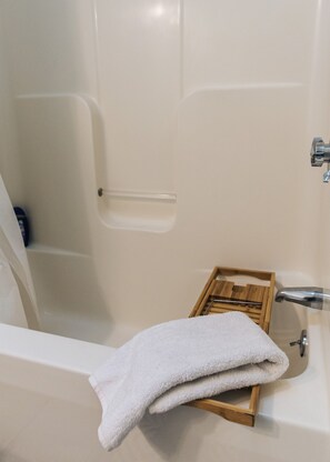 Combined shower/bathtub, hair dryer, towels, soap