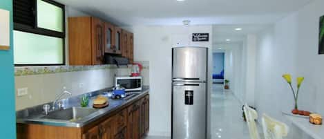 Fridge, microwave, coffee/tea maker, electric kettle