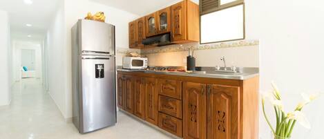 Fridge, microwave, coffee/tea maker, electric kettle