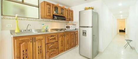 Fridge, microwave, coffee/tea maker, electric kettle
