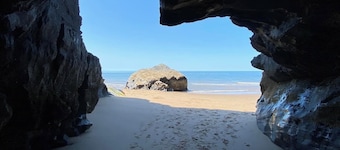 Trysor Holiday Cottage a stunning Coach house with sea views, near Penbryn beach
