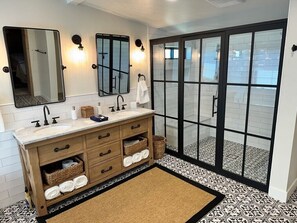 Combined shower/tub, hair dryer, towels, soap