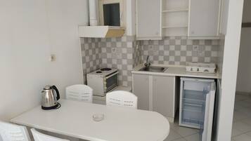 Apartamento, 1 quarto, sacada | Opções para refeição