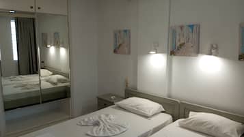 Apartamento, 1 quarto, sacada | 2 quartos, ferros/tábuas de passar roupa