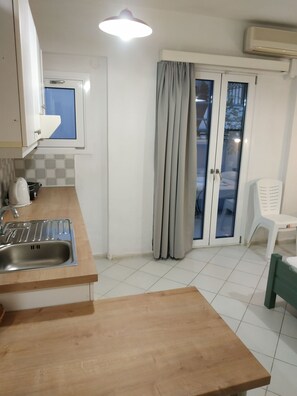 Studio, 1 Bedroom, Patio | Private kitchen | Cookware/dishes/utensils - Renia Studios Economy Studio Ground Floor (Malevizi)