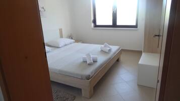 Apartment, 2 Bedrooms, Smoking, Patio | 3 bedrooms, iron/ironing board, WiFi