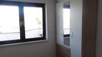 Apartment, 2 Bedrooms, Smoking, Patio | 3 bedrooms, iron/ironing board, WiFi