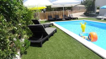 Appartement, 2 chambres, fumeurs, patio | Piscine | Piscine extérieure