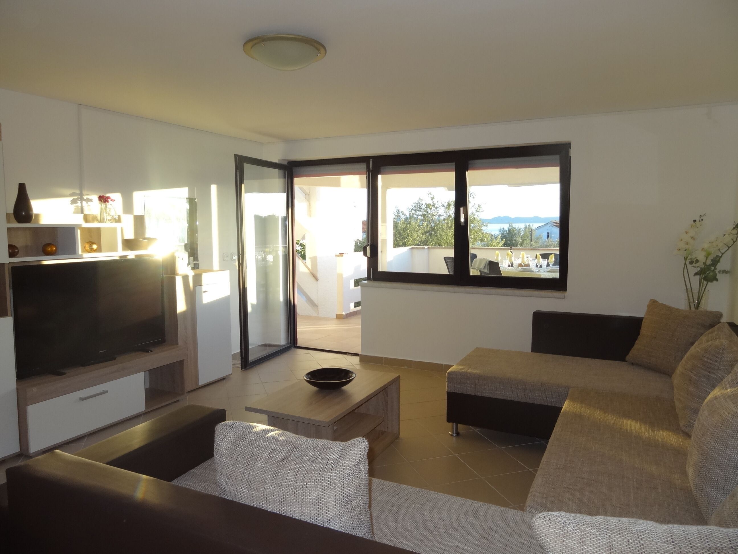 Apartment, 2 Bedrooms, Smoking, Balcony | Living area | TV