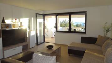 Apartment, 2 Bedrooms, Smoking, Balcony | Living area | TV
