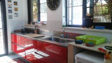 Villa, 3 Bedrooms, Balcony, Garden View | Private kitchen | Fridge, microwave, dishwasher, electric kettle