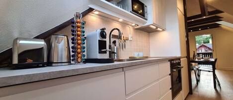 Apartment, 2 Bedrooms, Balcony, Garden View | Private kitchen | Coffee/tea maker