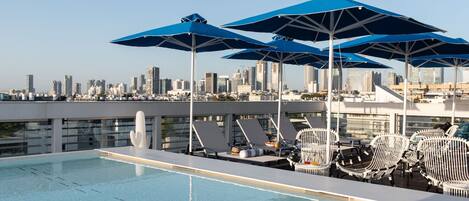 Outdoor pool, pool umbrellas, pool loungers