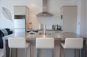 Microones, forn, placa de cuina i rentaplats 