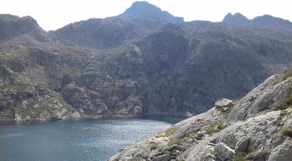 A mountainous landscape with a lake.