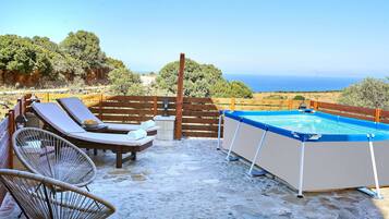 Seasonal outdoor pool, pool umbrellas, pool loungers