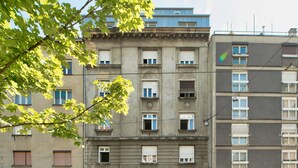 A multi-story building with a ground-floor shop named 'PEKARNIA'. - Colors of Music (Zagreb)