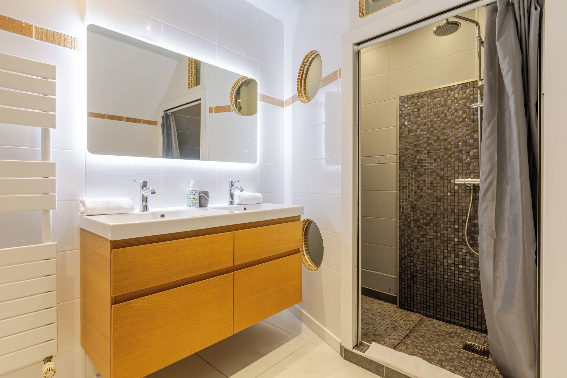 Bathtub, hair dryer, towels, soap