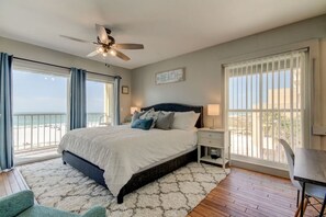 2 habitaciones, escritorio y tabla de planchar con plancha