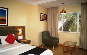 Suite estándar | Ropa de cama hipoalergénica y tabla de planchar con plancha