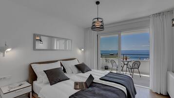 2 habitaciones, tabla de planchar con plancha y cuna de viaje