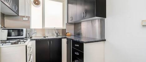 Fridge, microwave, oven, stovetop