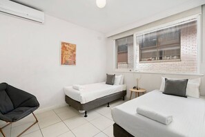 2 bedrooms, desk, iron/ironing board, travel crib