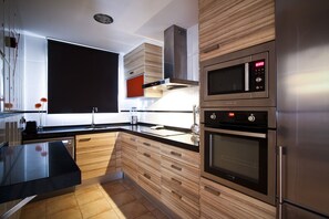 Réfrigérateur, micro-ondes, four, lave-vaisselle