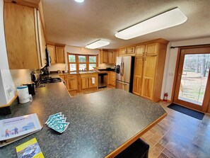 Fridge, microwave, oven, stovetop - Club 39 Rental In The Heart of The Manistee National Forest (Luther)