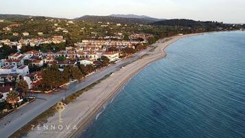 On the beach, white sand, 2 beach bars