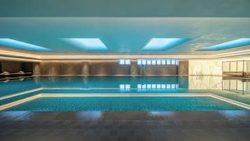 Indoor pool, open 7:00 PM to 10:30 PM, pool loungers, lifeguards on site