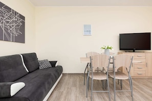 TV, offices - Forest Apartment with Balcony | 2.5 km from the beach (Wrzosowo)