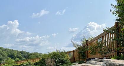 Nestled by the 7th green, large deck areas. Movie theatre for inside or out.