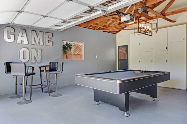 With a TV, pool table and more!