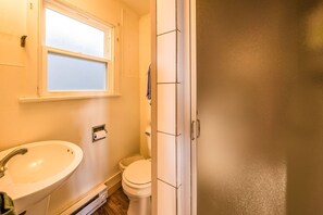 Shower, towels, soap, toilet paper