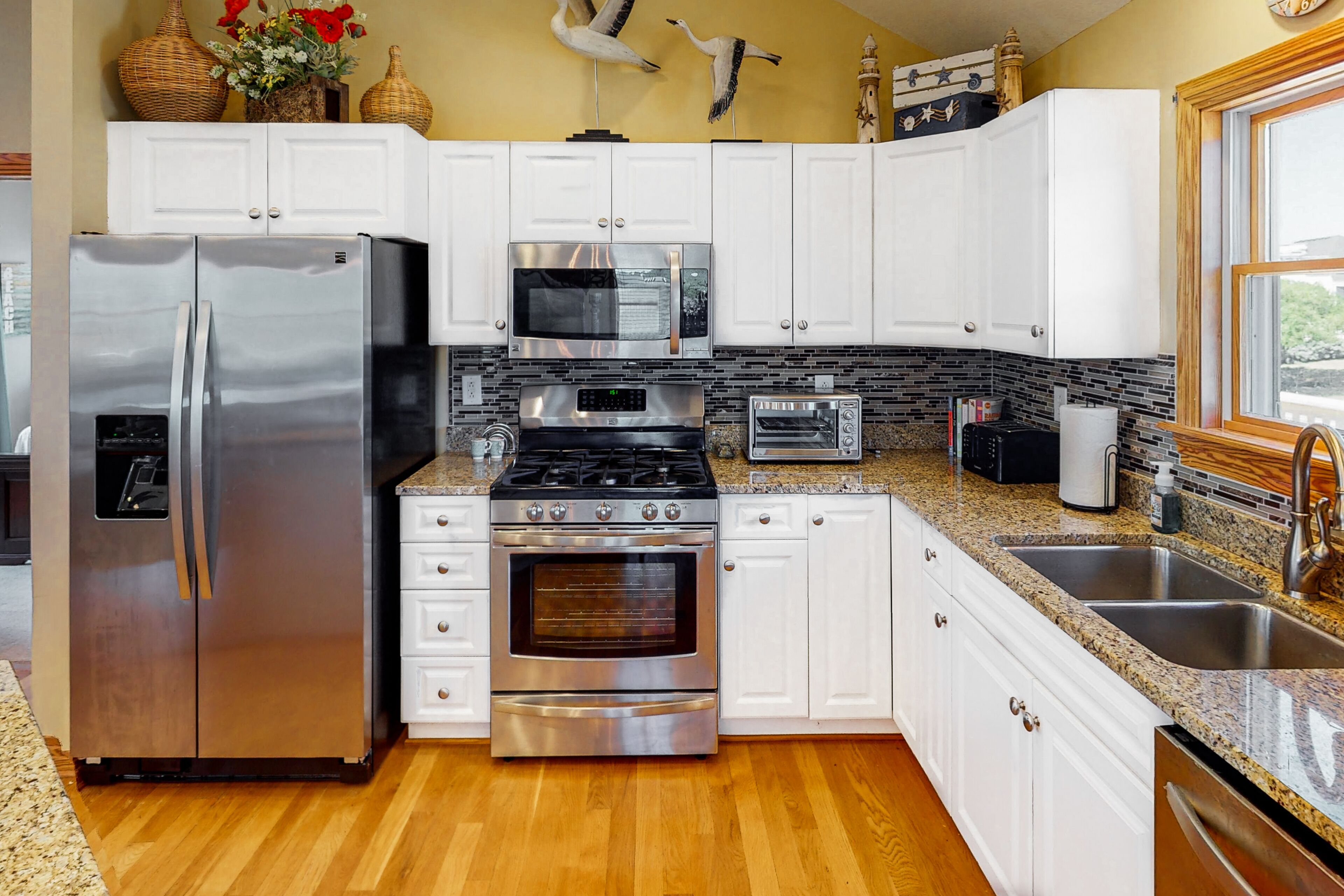 Dog-friendly home with sound views, pools, private hot tub, & sports courts