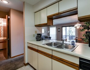 Condo (The Roost Royale-NO STAIRS -- Golf/Wa) | Private kitchen | Fridge, cookware/dishes/utensils, dining tables