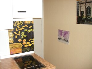 Fridge, microwave, coffee/tea maker, coffee grinder