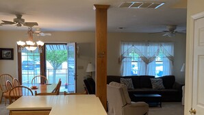 A spacious living area with a kitchen island, dining table, and seating. - 2 Blocks From Beach (Manasquan)