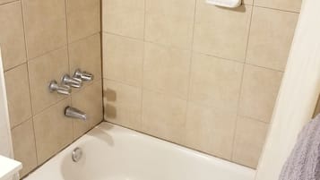Combined shower/tub, hair dryer, towels, soap