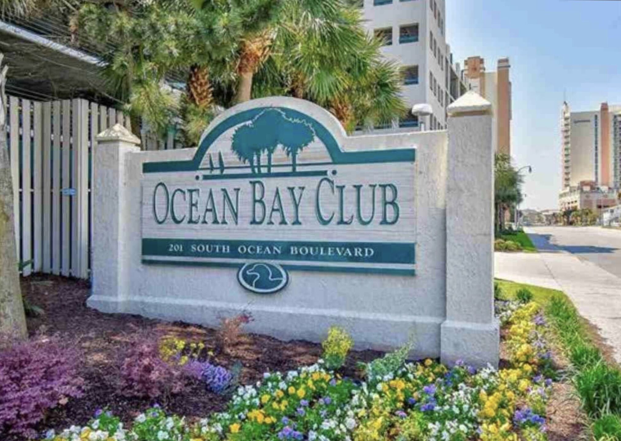 A sign for Ocean Bay Club at 201 South Ocean Boulevard.